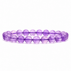 Amethyst crystal bracelet with polished translucent purple round beads on a white background