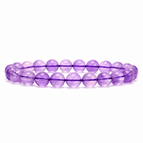 Amethyst crystal bracelet with polished translucent purple round beads on a white background