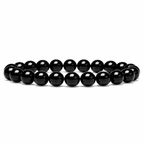 Black obsidian bracelet with glossy polished round beads displayed on a clean white background