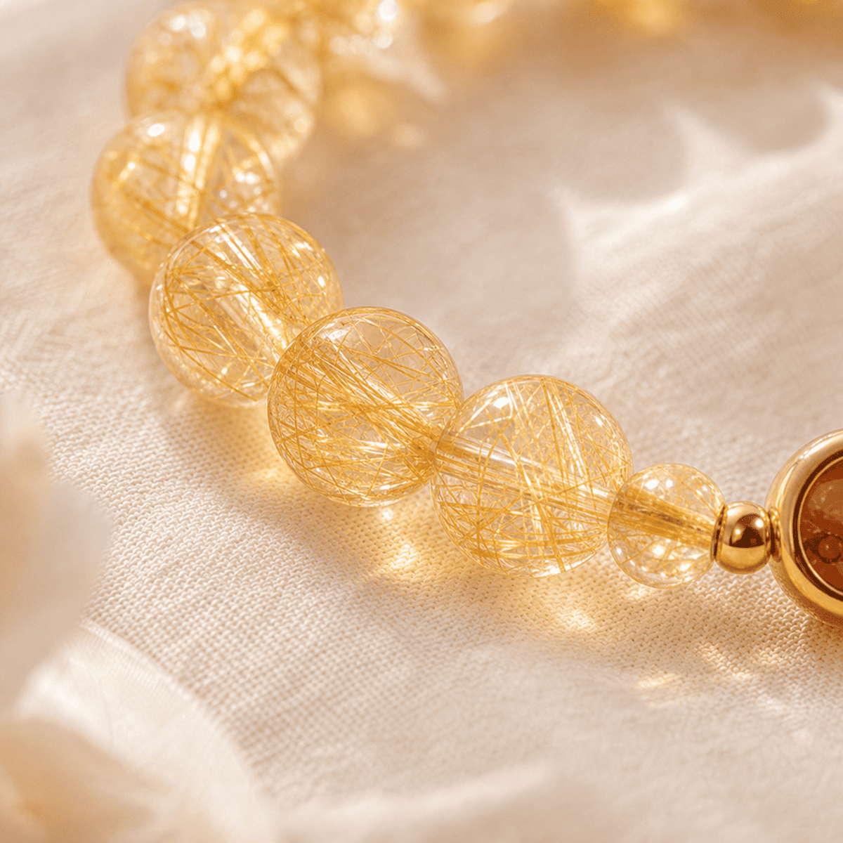Macro detail of Citrine Bracelet beads with golden rutilated inclusions, highlighting the natural glow of a crystal bracelet for women
