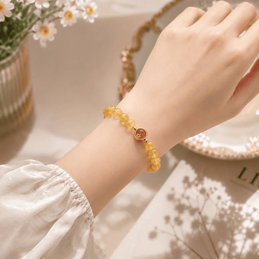 Golden rutilated quartz bracelet for a crystal bracelet selection guide