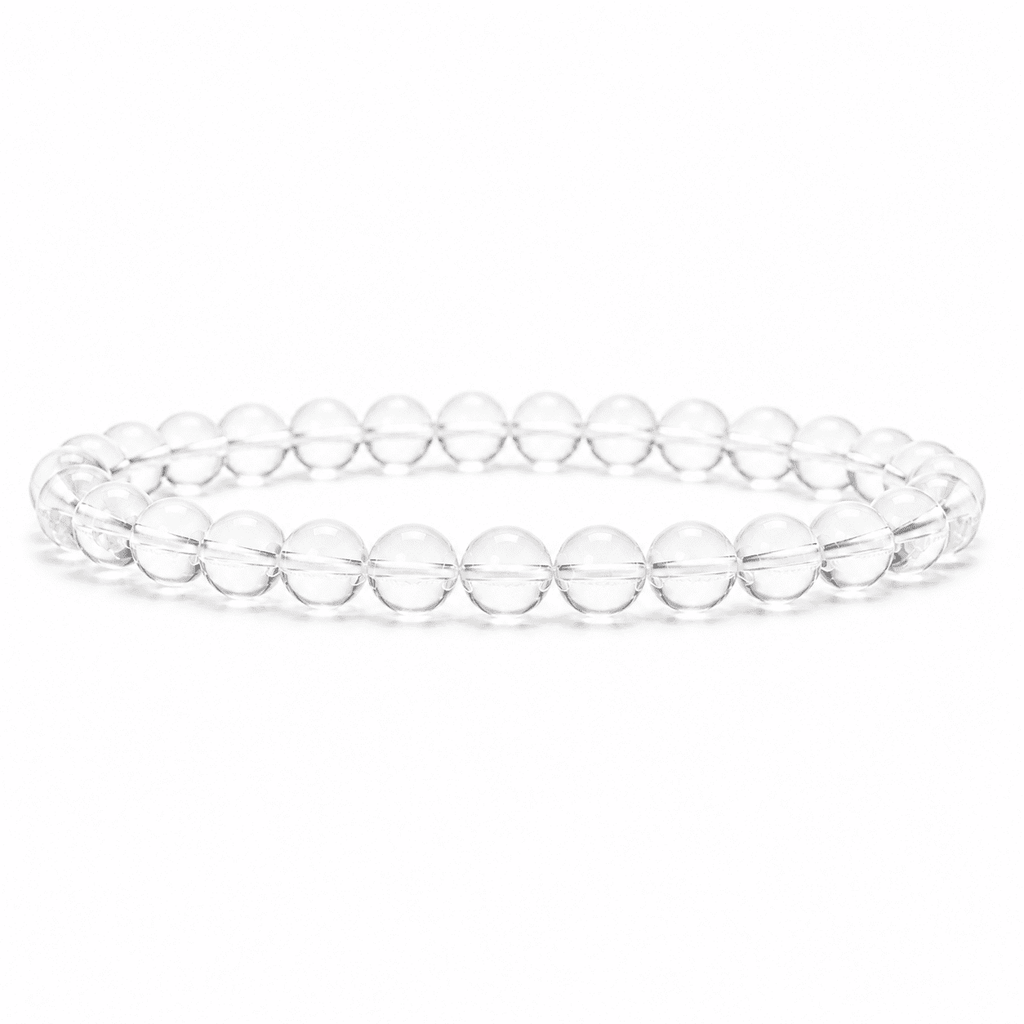 Clear quartz bracelet with transparent polished round beads centered on a clean white background