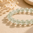 Close-up of Green Rutilated Quartz beads showing fine green inclusions in a luminous Green Crystal Bracelet
