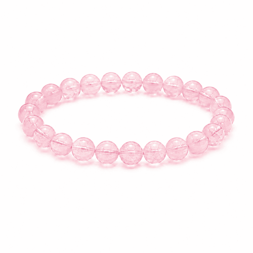 Rose quartz crystal bracelet with polished pink beads on a white background